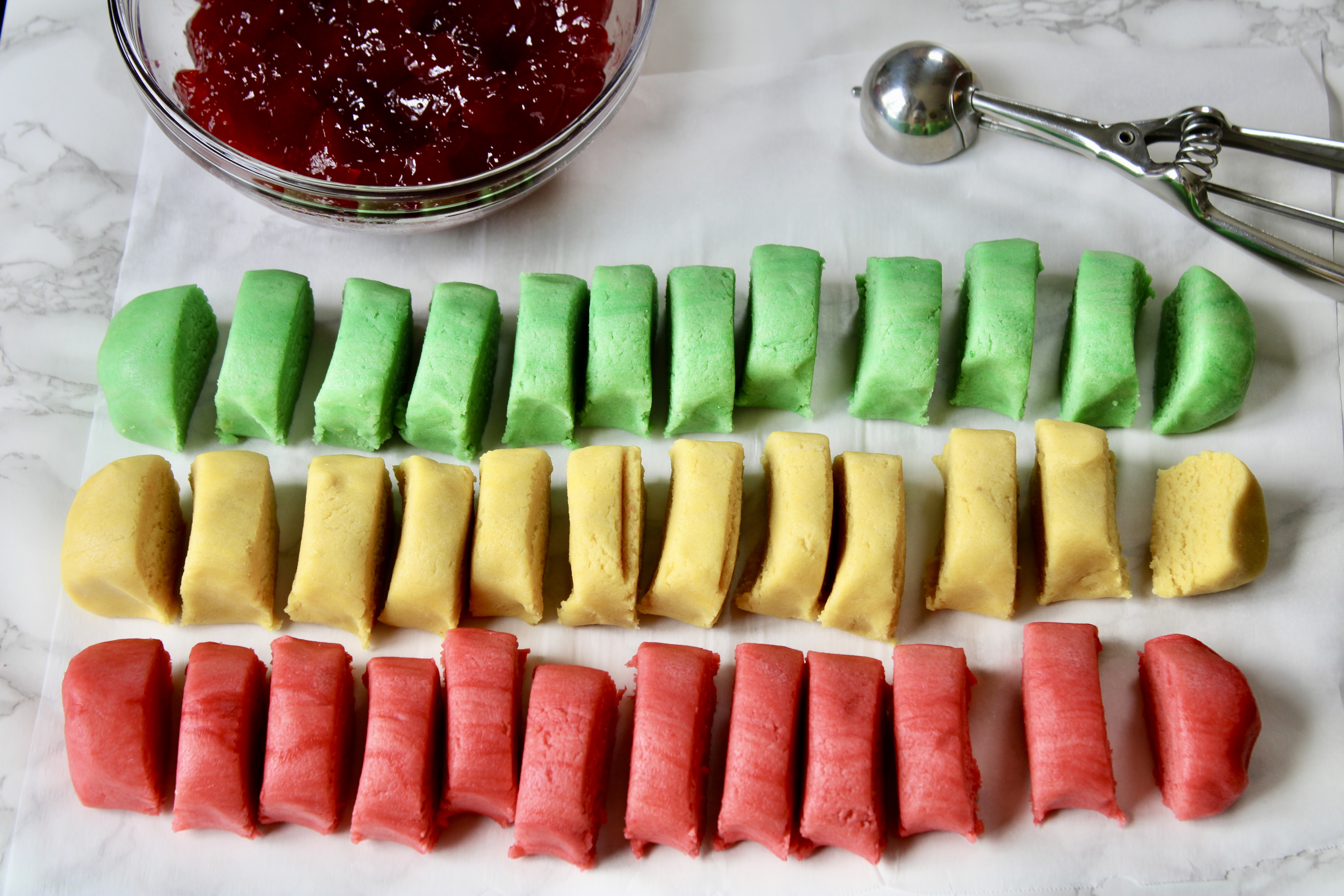 Italian rainbow sugar cookie dough cut into pieces